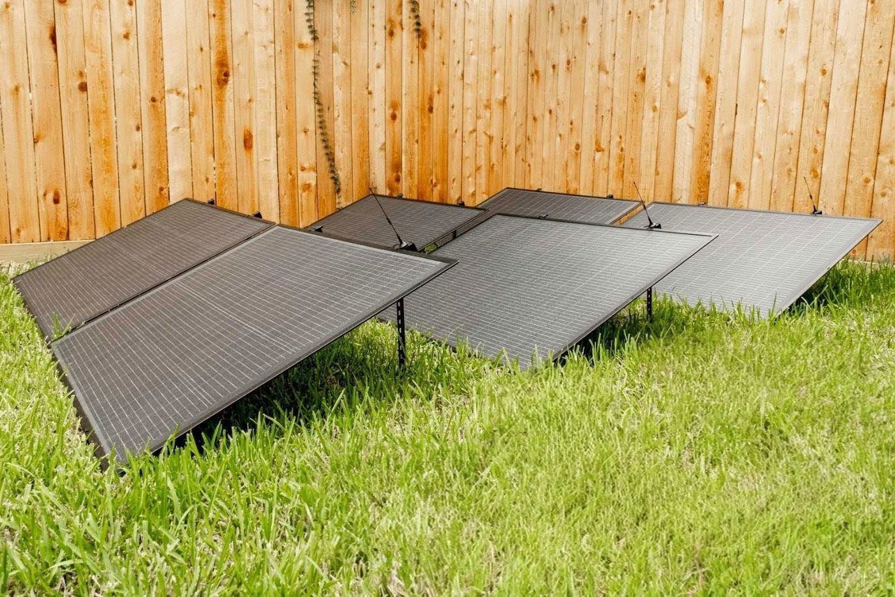 Semi-flexible Terrace Solar panels on low stands in a yard.